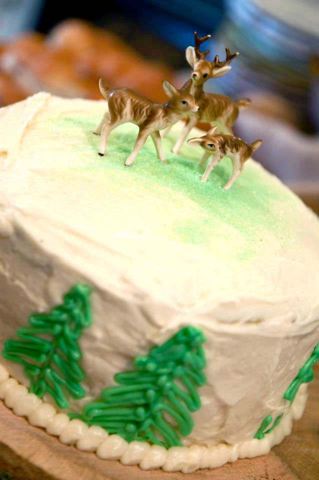 Our cake, which was a bit of an experiment, ended up working out! We made the trees out of colored white chocolate and found the deer on ebay!